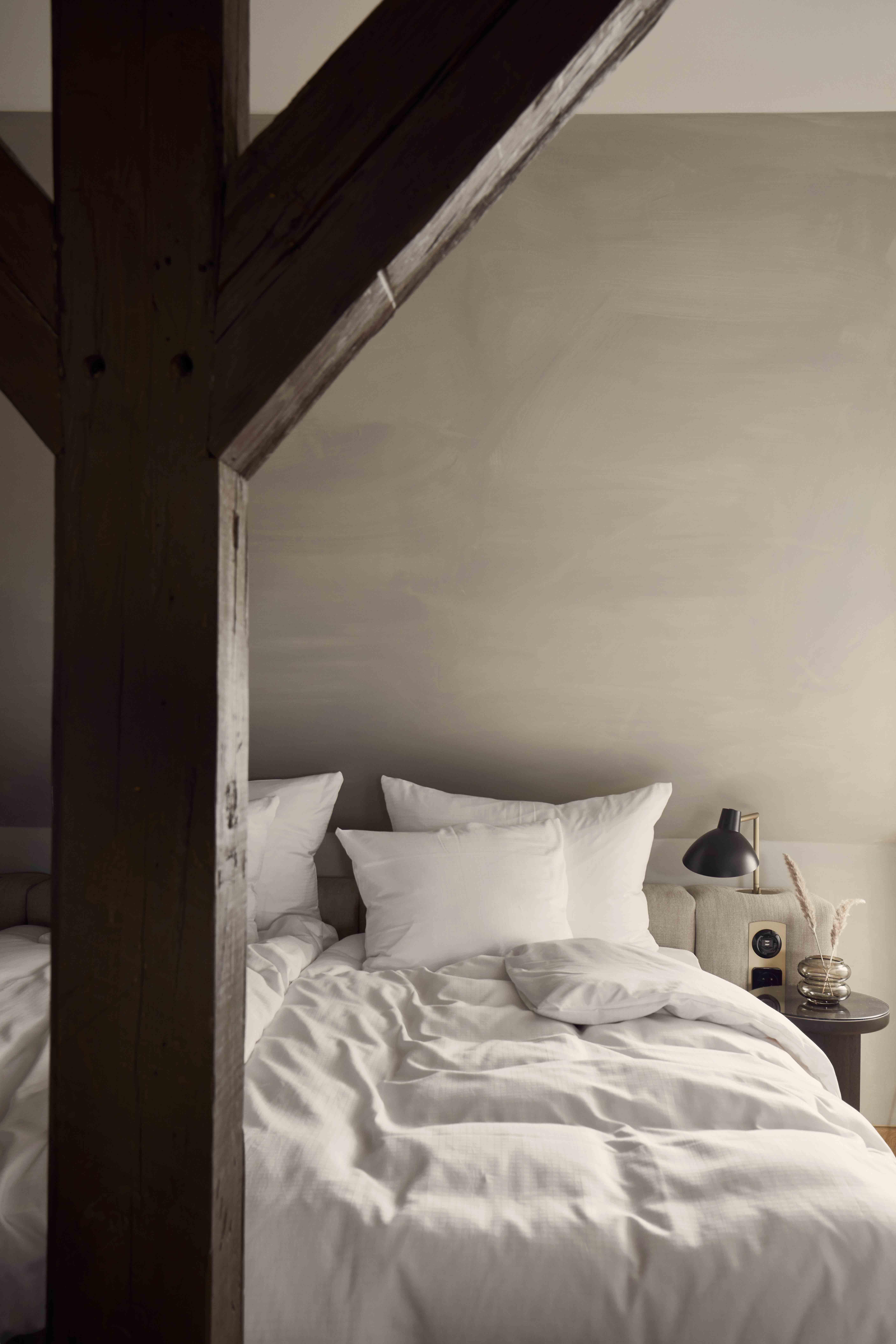 Villa Copenaghen Esterno foto A bed with a nightstand